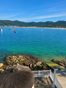 a view of a large body of water at Apartamento no Costão do Pântano do Sul in Florianópolis