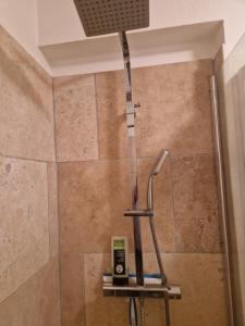 a shower in a bathroom with a shower at demeure du ventoux in Aubignan +4 photos