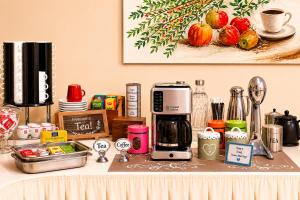 a kitchen counter with a coffee maker on it at City Life Port Hotel in Heraklio