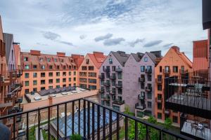 a view of a city with many buildings at Golden Eagle Luxury Apartment - Granary Island- Gdańsk Old Town in Gdańsk