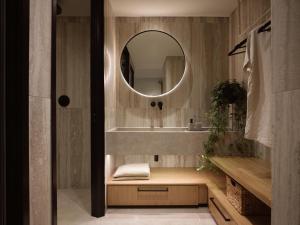 a bathroom with a sink and a mirror at Horizon Collection in Agios Nikolaos