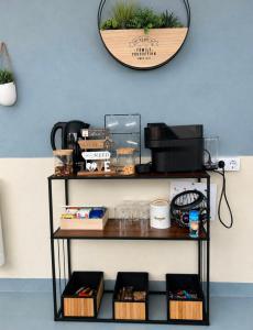 a shelf with items on it against a wall with a mirror at Mirador da Guarda in A Guarda