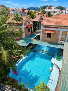 an overhead view of a swimming pool in a house at Gecko Backpackers Hostel in Ninh Binh