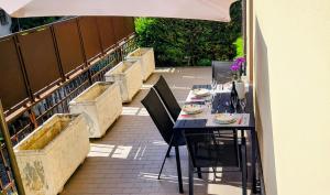 a table and chairs sitting on a patio at Casa Leonardo in Tirano