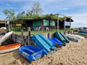 a group of boats sitting on the beach at Chambre d'hôtes du Carrousel in La Teste-de-Buch