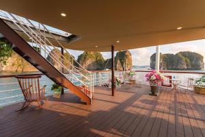 a deck of a cruise ship with a staircase at Petit Prince Cruise in Cat Ba +27 photos