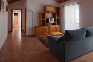 TV a/nebo společenská místnost v ubytování Casa do Zé - AL