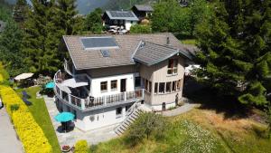 an aerial view of a house with a solar roof at Haus Schröcker in Gaschurn