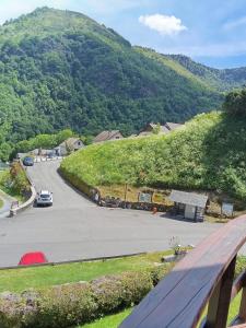 a view of a parking lot with a mountain at Chalet Borce 64 in Borce