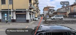 a car is parked on the side of a street at B&B Mavi in Como