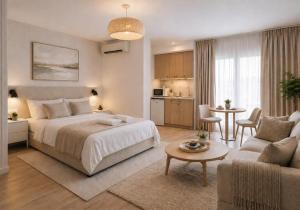 a bedroom with a bed and a living room at Hostal Palma Hermosa in El Puerto de Santa María