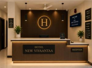a hotel lobby with a hotel new yorkania sign at New Vivaantaa Hotel in Aurangabad