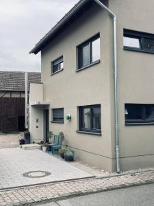 a house with windows and a street light next to it at Zone 3 in Erfurt