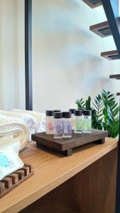 a tray with four coffee cups on a table at Dris Loft in Nikiana