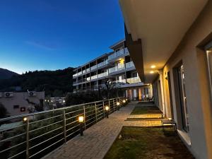a balcony of a building with lights on it at Serenity De Lluxe in Kavač