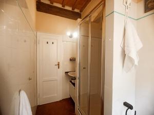 a bathroom with a glass shower and a toilet at Il sogno di Tania in Pescia +40 photos