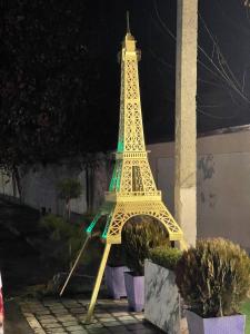 a model of the eiffel tower at night at Rest hotel in Samarkand