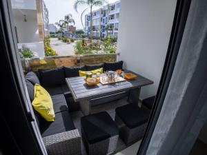 Prostor za sedenje u objektu Appartement Haut Standing - 5 personnes - Résidence Gardénia avec Piscine - Parking