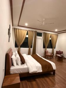 a bedroom with a large bed in a room at Jawai Mount Town in Mori Bera +26 photos