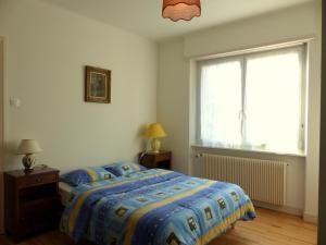 Postel nebo postele na pokoji v ubytování Gîte du moulin