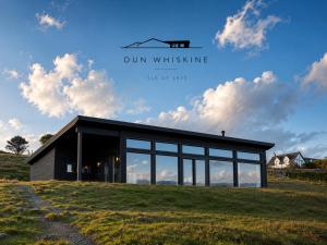 a building with the words run whisking next to it at Luxury Nordic Lodge with private Sauna in Glendale