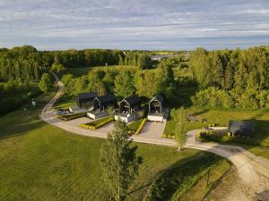 an aerial view of a house with a driveway at WakeMālpils brīvdienu mājas in Mālpils