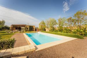 a swimming pool in the backyard of a house at New to the market - 4BR Farmhouse with Pool by SF Homes in Siġġiewi