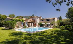 a house with a swimming pool in a yard at villa la Sine in Vence