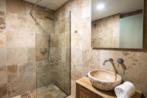 a bathroom with a sink and a shower at Nik Palas Luxury Residence in Sandanski +31 photos