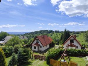 an aerial view of a house in the countryside at Dzika Stokrotka in Idzików