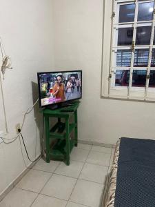 a television sitting on a table in a room at Comfortable house with an excellent location in Veracruz