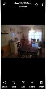 a room with a dining room table and a kitchen at Nijsha Enterprise in Jonesboro
