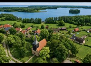 an aerial view of a small village with a church at Ferienwohnung An Der Dorfkirche in Vipperow