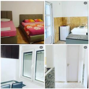 a room with a bed a sink and a refrigerator at Apartmani Ljilja in Zgrada