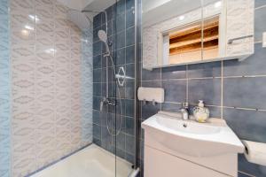 a bathroom with a sink and a toilet and a shower at Beach Suite Nina in Rab +141 photos