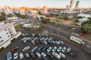 an aerial view of a parking lot in a city at Savana Hotel in Uberlândia