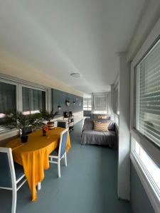 a room with a table and a bed and a bedroom at Mirador da Guarda in A Guarda