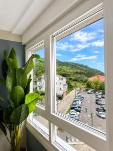 a window with a view of a parking lot at Mirador da Guarda in A Guarda