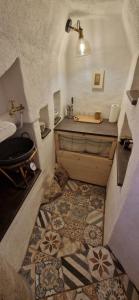 a bathroom with a sink and a counter with a sinkessment at Veža na vlásku in Háj +20 photos