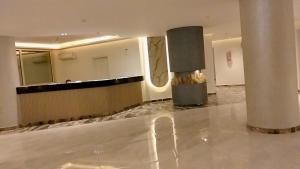 a lobby with a reception desk and a lobby at Luxury Studio, pool, Private beach & close to Airport in Hurghada +187 photos