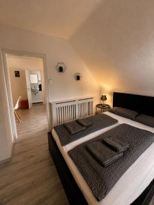 a bedroom with a large bed in a room at STAY - City W32 in Friedrichshafen