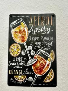 a chalkboard sign with two martini glasses at STAY - City W32 in Friedrichshafen