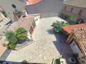 an overhead view of a courtyard of a house at Casa rural Cal Codina in Prats de Rey