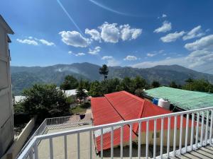 a view of the mountains from a balcony at Hillcrest Terraces Bhurban in Rāwāt