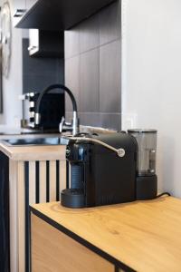a toaster sitting on top of a counter in a kitchen at alloggio belvedere nel borgo in Gradoli