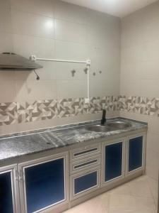 a kitchen with a sink and a counter top at Beautiful 2-bedroom apartment in Assomada