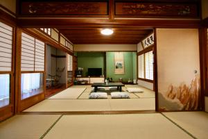a room with a table in the middle of a room at Sane Yanagisawa in Awaji