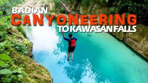 a man jumping into a river with the words brazil camping tokawas at RMBC beds and breakfast in Badian