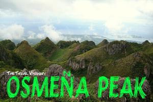 a picture of a mountain with the words oemina peak at RMBC beds and breakfast in Badian +5 photos