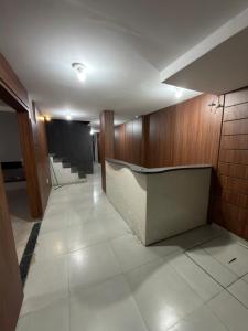 a hallway of a building with a waiting room at Hotel SP in Belém